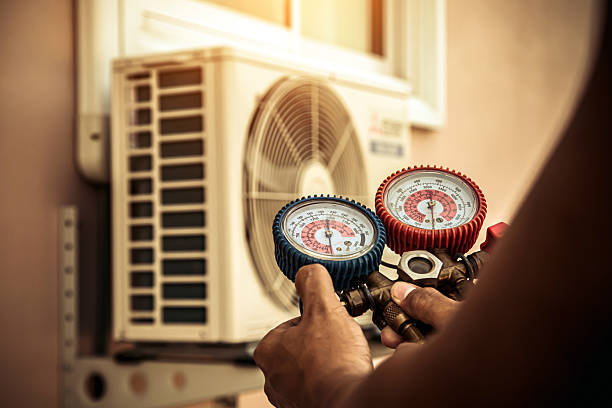 Professional Hvac technician working in Bally, PA